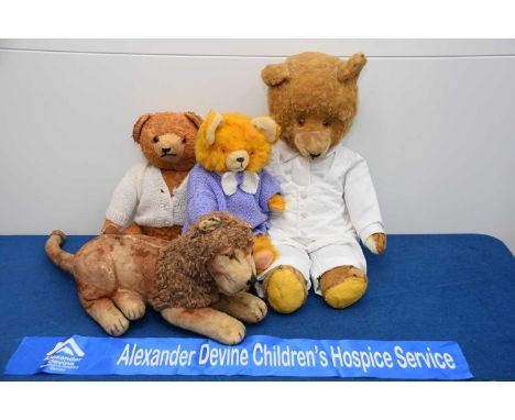 Four post war plush soft toys, AF, the largest Teddy Bear 63cm in fancy white waistcoat, a lion and two further Teddy Bears, 