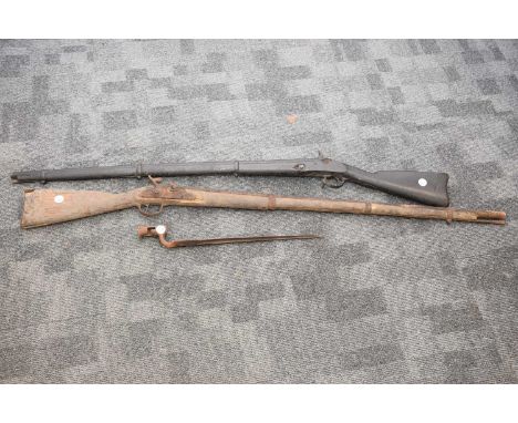 Two antique and heavily worn musket rifles and a Victorian bayonet, thank you for looking at this lot which is being sold on 