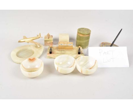 A large collection of carved onyx items, including cigarette boxes, desk items, ashtrays and more, thank you for looking at t