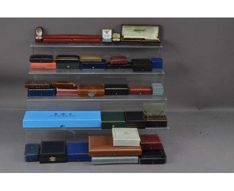A good collection of jewellery boxes, most leather with gilt tooled decoration, including Longines, Harrods, Garrard, Tessier