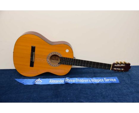 A modern Encore acoustic guitar, thank you for looking at this lot which is being sold on behalf of The Alexander Devine Chil