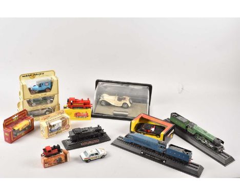 A small group of diecast models and other train related items and more, thank you for looking at this lot which is being sold