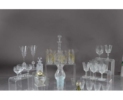 A collection of clear glassware Including champagne flutes, whisky decanter, sherry glasses, brandy glasses and others, thank