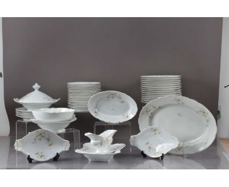 A part dinner service hand painted with daisies and blue flowers, scalloped edging including 1 lidded terrine, 1 meat platter