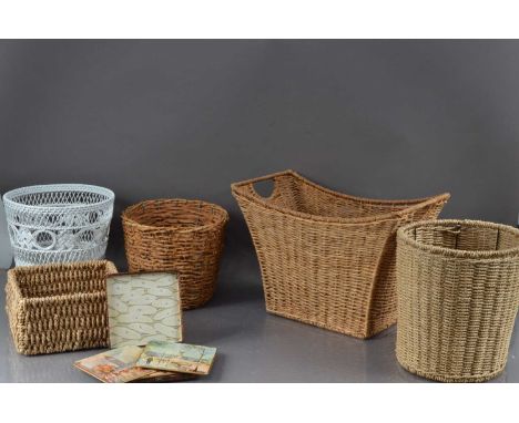 A cased set of 1960s place mats, scenes of London, together with a collection of wastepaper bins and twin handled wicker bask