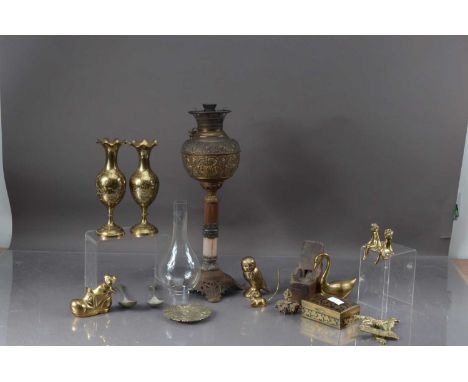 A pair of brass Middle Eastern vases, a brass oil lamp, a pair of brass fogs, brass owl, and other items, thank you for looki