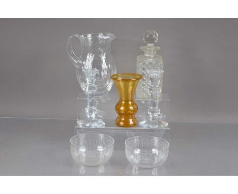 A lead crystal jug with a writhen body, together with a pair of lead crystal candlesticks, a pair of engraved glass finger bo