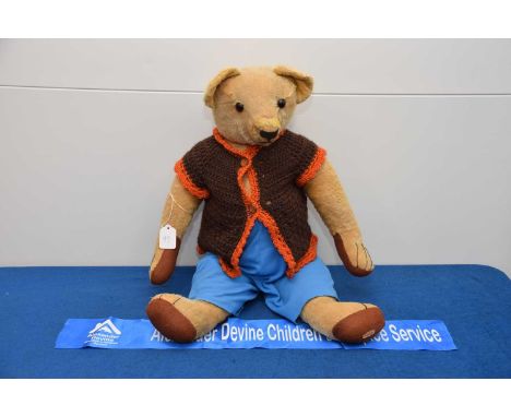 A large c1930s Chad Valley Teddy Bear, AF, blonde mohair worn and signs of gluing, notably to nose, later clothing, 70cm, tha