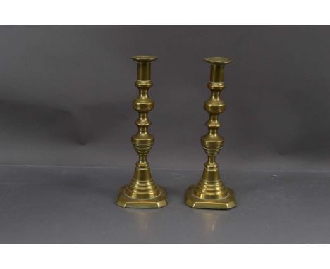 A Pair of Brass 19th Century Candle Sticks, 27 cm high, thank you for looking at this lot which is being sold on behalf of Th