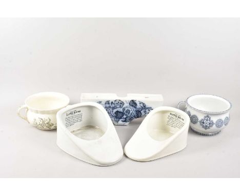 Five toilet pottery items, including two The New Slipper Bed Pan's, a cistern bracket, damaged, and two traditional bed pots,