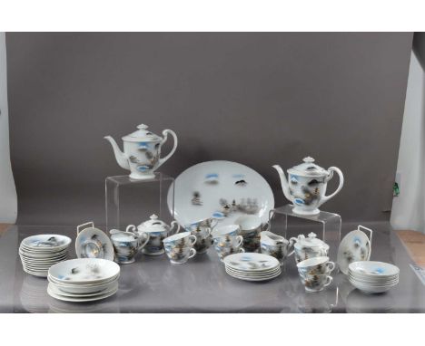 An extensive Japanese eggshell tea service, with a lithophane of a Geshia, thank you for looking at this lot which is being s
