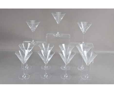 A good set of Eleven 'ARC' Crystal cocktail or martini glasses variously 'harlequin' patterned, each 19cm high, French, late 