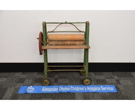 A c1960s Tri-ang child's clothes mangle, AF, thank you for looking at this lot which is being sold on behalf of The Alexander