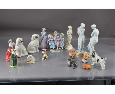 A Pair of Bisque porcelain figures, modelled as females in a state of undress circa 1880 29cm high together with a Royal Dalt