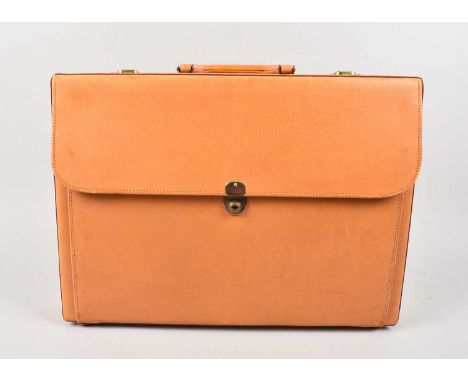 A c1980s tan leather briefcase, one day Rodder's we will be millionaires! thank you for looking at this lot which is being so