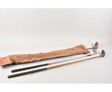 5 vintage golf clubs and bag, thank you for looking at this lot which is being sold on behalf of The Alexander Devine Childre