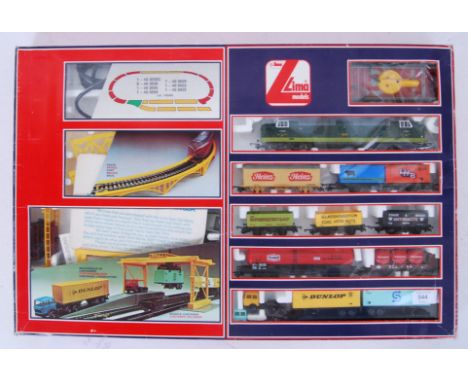 LIMA: An original vintage Lima Models 00 gauge railway train set ' Container Unloader ' set. Within the original box.