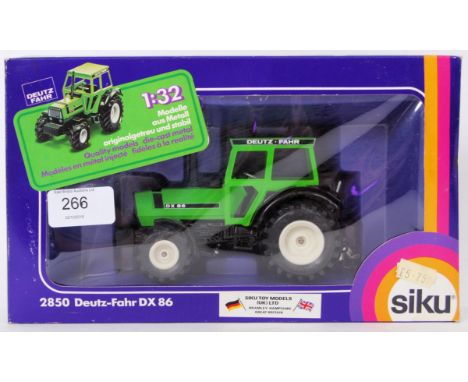 SIKU: A boxed Siku diecast model Tractor - 2850 Deutz-Fahr DX86. Mint, within the original box.