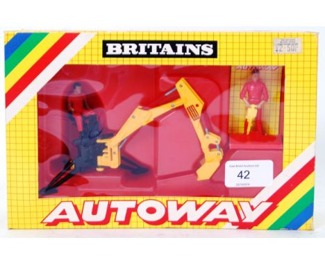 BRITAINS: An original vintage Britains Autoway series 9838 ' Rear Digger ' boxed diecast model and figure set. Mint, in the o