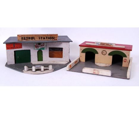 GARAGES: Two charming vintage post-war wooden made toy garages. The first being ' Park Petrol Station ' by unknown maker, the