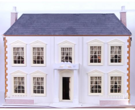 'THE MANOR' DOLLS HOUSE: A beautiful 20th century Manor House wooden dolls house. Well proportioned, and highly detailed. Com