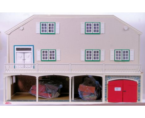 LUNDBY DOLLS HOUSE: A good vintage 1960's Lundby of Sweden made dolls house. Two parts, with stable section beneath. The fron
