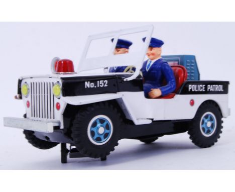 POLICE PATROL: An original vintage likely 1960's Daiya ' Made In Japan ' ' Police Patrol Jeep ' battery operated tinplate veh
