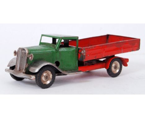 TRIANG MINIC: An original vintage Triang Minic tinplate clockwork flatbed truck. Original paintwork in red and green, with ru