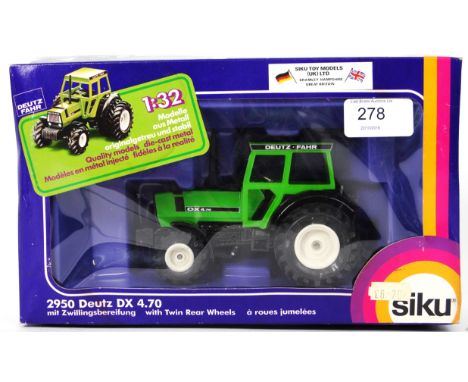 SIKU: A boxed Siku diecast model Tractor - 2950 Deutz DX 4.70. Mint, in original box. 