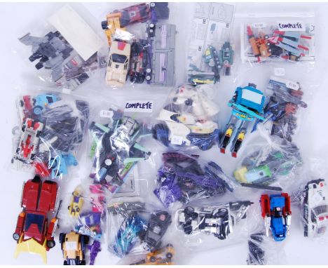 TRANSFORMERS: A collection of vintage 1980's G1 Transformers toys by Hasbro, to include: Thrust, Inferno, Land Military Team,