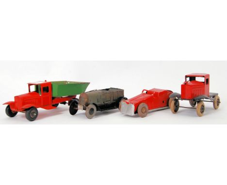 TINPLATE: A collection of 4x pre-war made tinplate vehicles. The first being a painted Triang Tipper lorry, another being a v