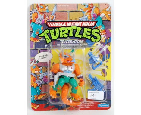 TEENAGE MUTANT NINJA TURTLES: An original vintage 1990's Playmates made Teenage Mutant Ninja Turtles 46 back carded ' Tricera