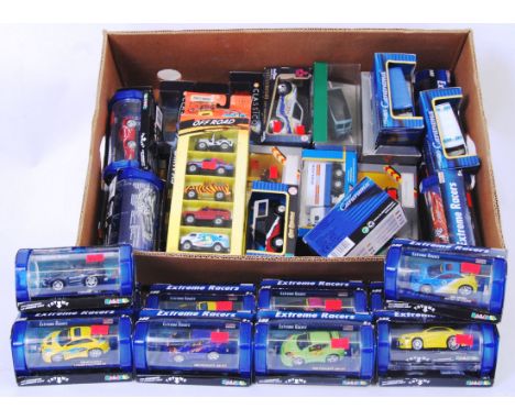 DIECAST: A collection of assorted boxed diecast model cars to include Corgi Classics, Extreme Racers, Cararama, Classico etc.