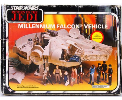 STAR WARS: An original vintage Star Wars Millennium Falcon action figure playset. 100% complete with struts, satellite dish, 