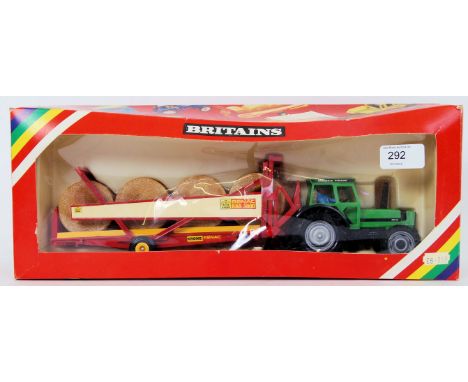 BRITAINS: An original vintage Britains diecast model 9602 Deutz Tractor. Mint, within the original box (plastic box window sp