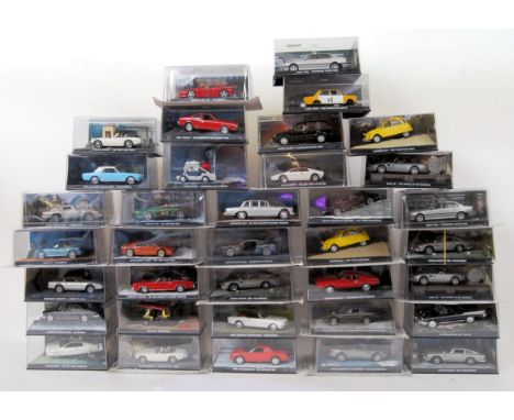 JAMES BOND: A collection of 36x Eaglemoss James Bond diecast model cars, some with diorama bases. All within the original pre