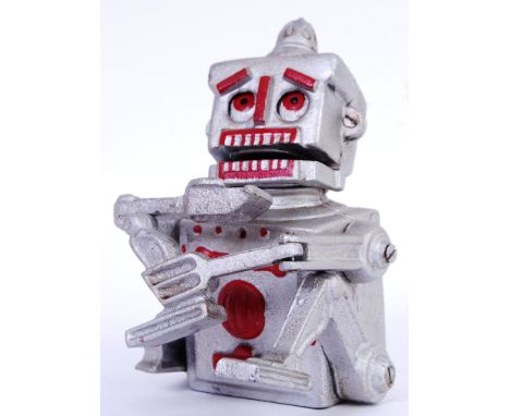ROBERT THE ROBOT: A good vintage style 20th century cast iron money box ' Robert The Robot ' with date to back for 1950. Movi