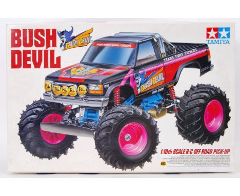TAMIYA: An original vintage Tamiya ' Bush Devil ' radio controlled truck. With original box. Appears to be complete, comes wi