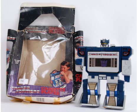 TRANSFORMERS: An original vintage 1980's Hasbro made scarce Transformers ' Cassette Player ' action figure. 1985. With origin