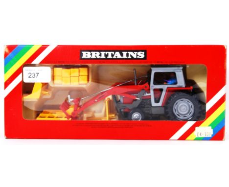 BRITAINS: An original Britains diecast model Farm Tractor 9595 Massey Ferguson. Mint, within the original box.