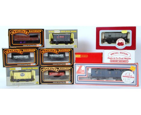00 GAUGE: A collection of assorted boxed vintage 00 gauge rolling stock, to include Mainline, Dapol, Lima, Wrenn and Hornby. 