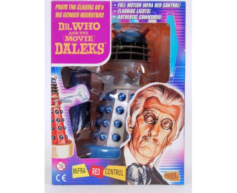 DOCTOR WHO: A rare Doctor Who Product Enterprise made ' Movie Dalek ' model. The Dalek in blue and silver. Mint, unused, with