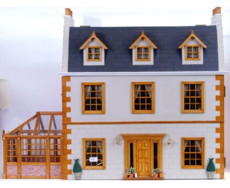 DOLLS HOUSE: A beautiful 20th century dolls house with conservatory. Well proportioned, and incredibly detailed. Comes with f