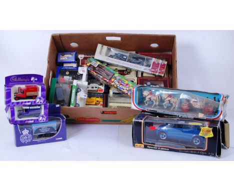 DIECAST: A collection of assorted boxed diecast models to include Corgi, Lledo, Vanguards, Maisto 1:18 scale and others. All 