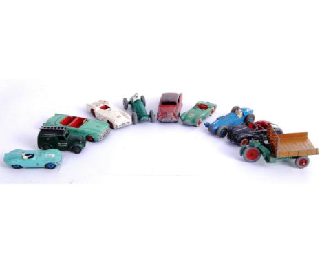 DINKY: A collection of 10x original vintage Dinky diecast models, comprising of: Ford Sedan, 110 Aston Martin, 238 Jaguar, 23