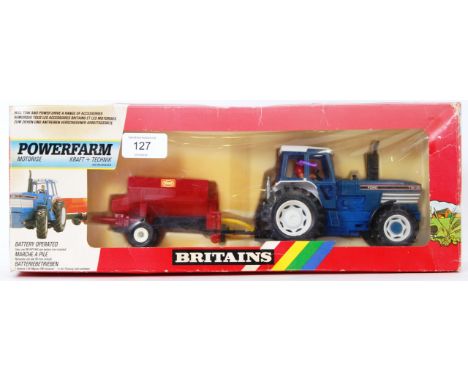 BRITAINS: An original vintage Britains Farm diecast model 9381 Ford Tractor With Spreader. Mint, within the original box.