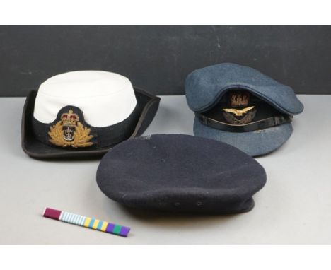 A Vintage Royal Air Force Officers Peaked Cap Complete With Queens Crown Cap Badge Together With Female Naval Officers Cap Wi