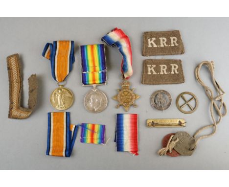 A British World War One Full Size Medal Group To Include The 1914-1915 Star Medal, The 1914-1918 British War Medal And The Gr