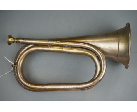 A British Military Nickel Plated Brass Bugle. 