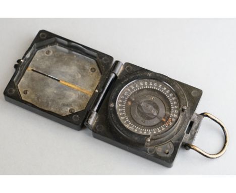 A World War Two Era Mark 1 Magnetic Marching Compass By T.G.Co. Ltd, Serial No.B228838, Marked With The Broad Arrow.